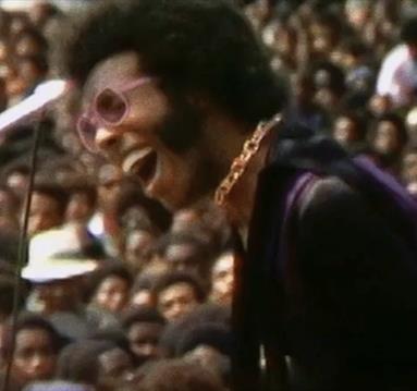 man performing to a crowd