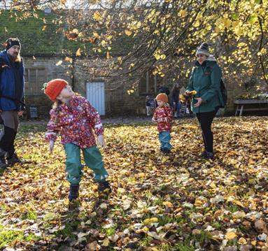 Visitors exploring the grounds of Hardwick Hall