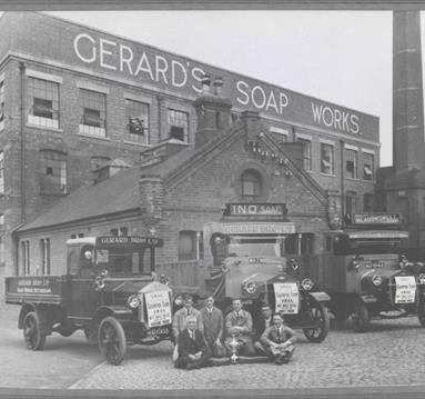 Workers pose for a picture in front of Gerard's Soap Works