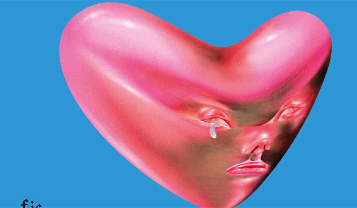 Heart ballon against a blue background