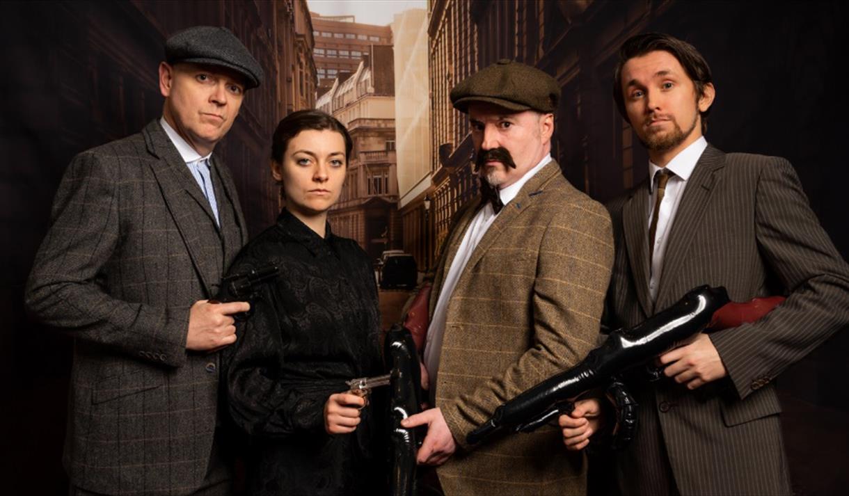 image of people dressed up in 'peaky blinders' get up