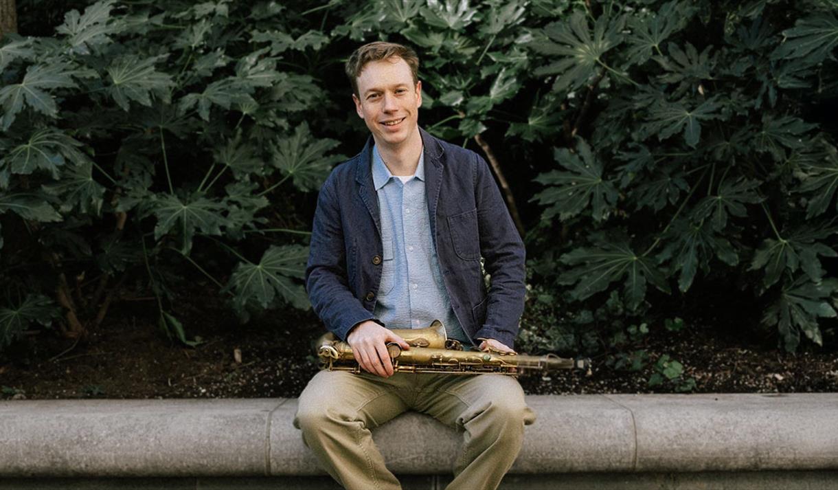 Sam Braysher sat with saxaphone