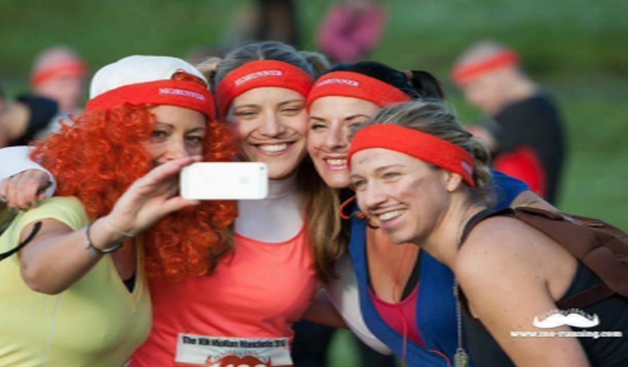 people celebrating after a run