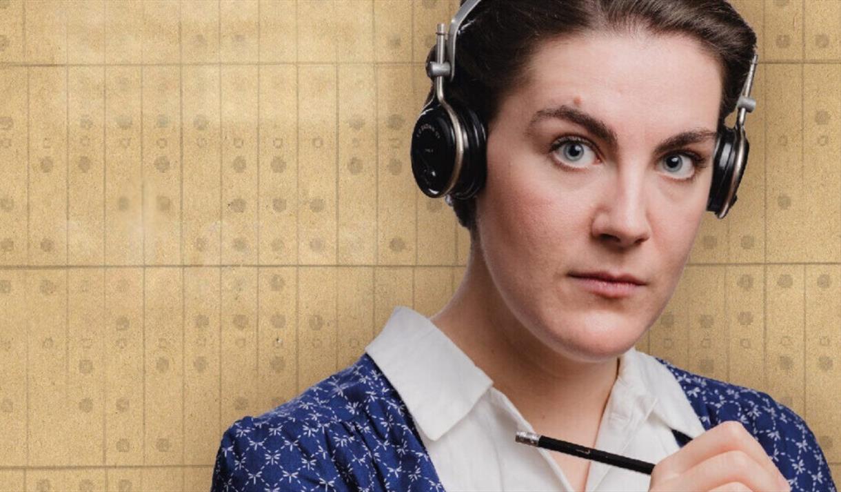 image of a woman with headphones