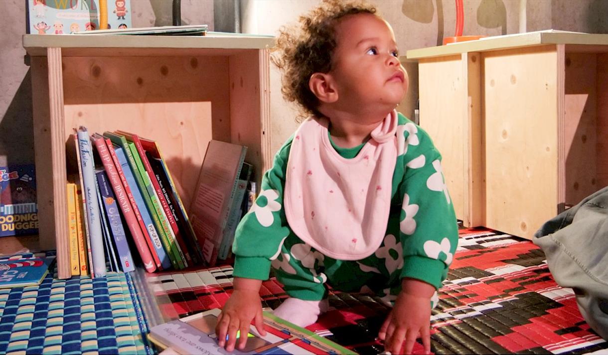 baby on the bedroom floor