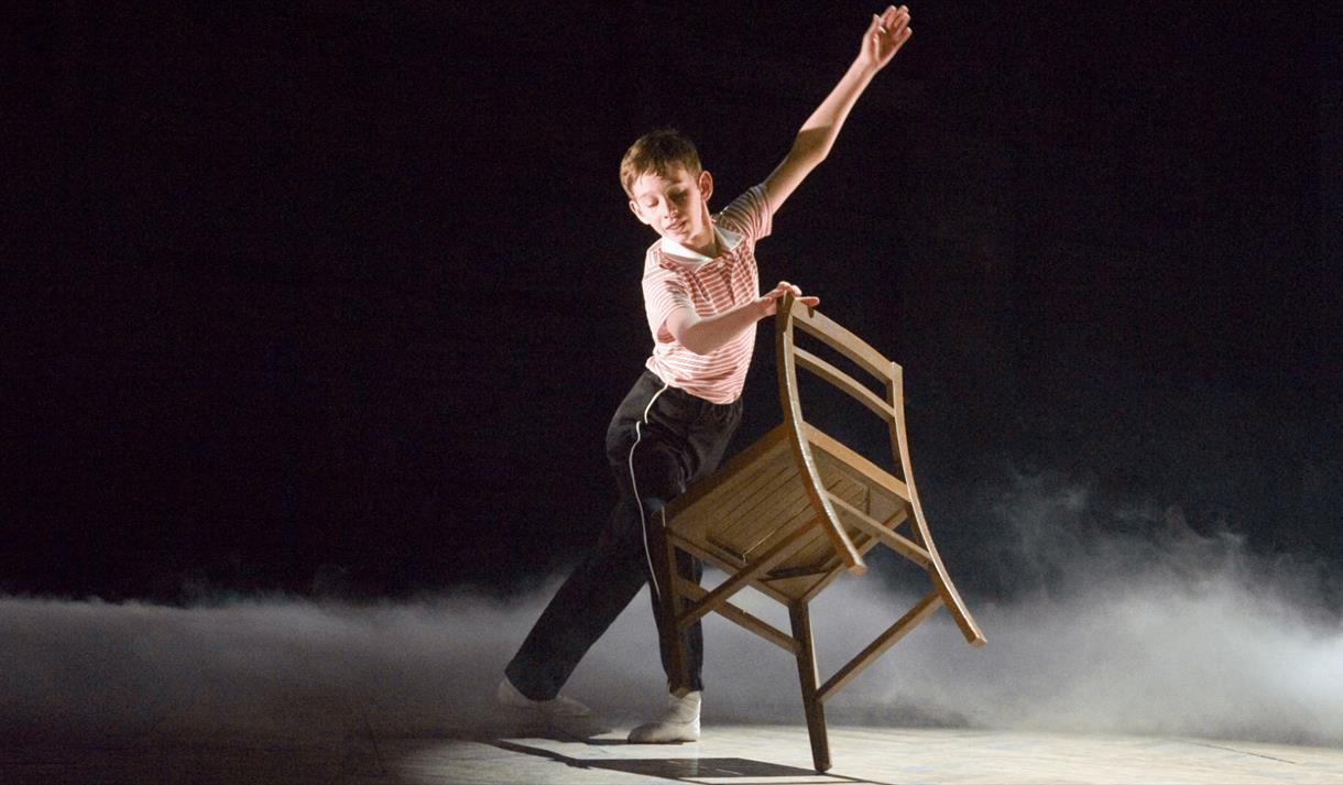 boy dancing on stage