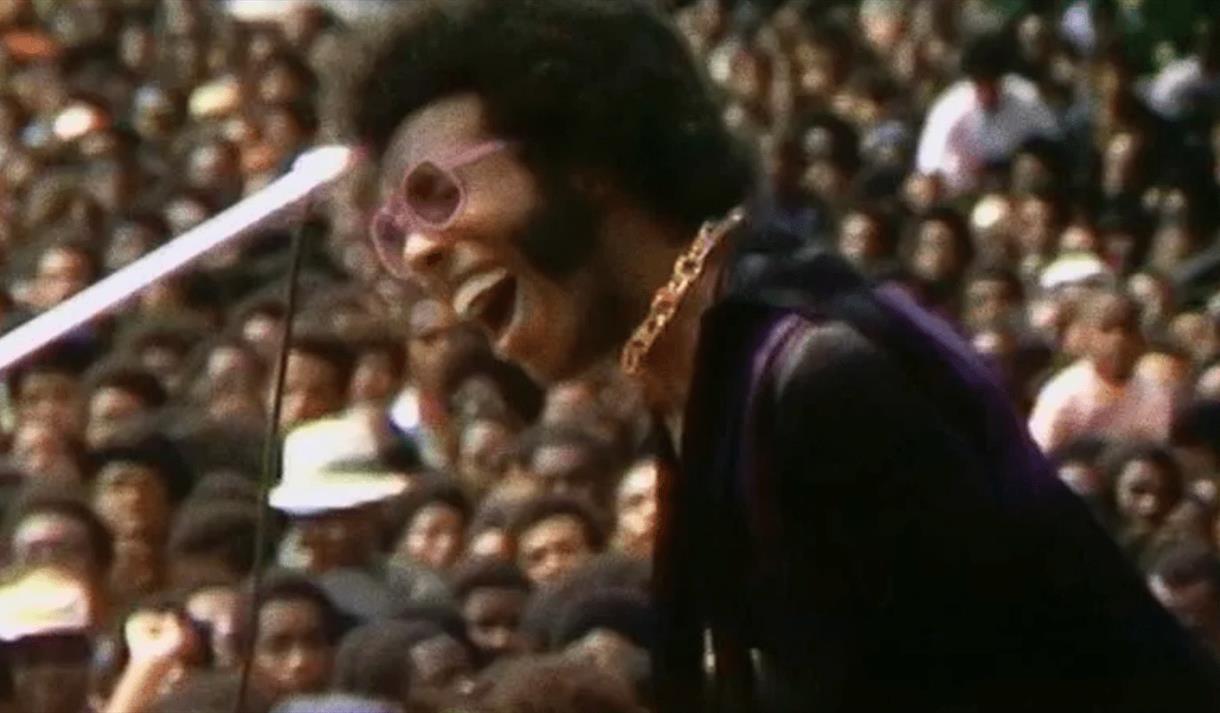 man performing to a crowd
