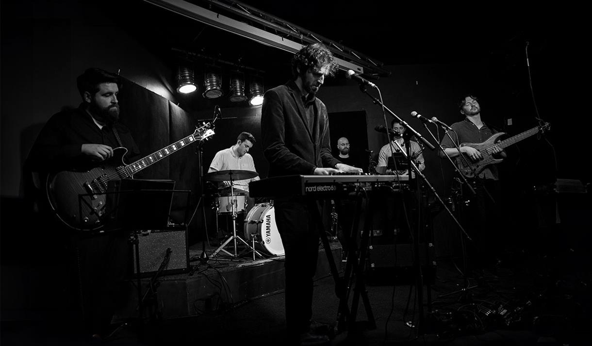 Black and white photo of Nimbus Sextet

