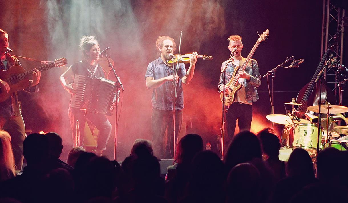 Photo of Solana performing on stage