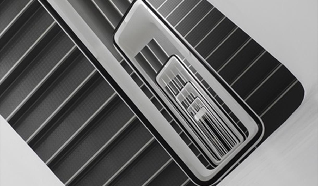 The image shows a flight of stairs from a middle view looking downwards