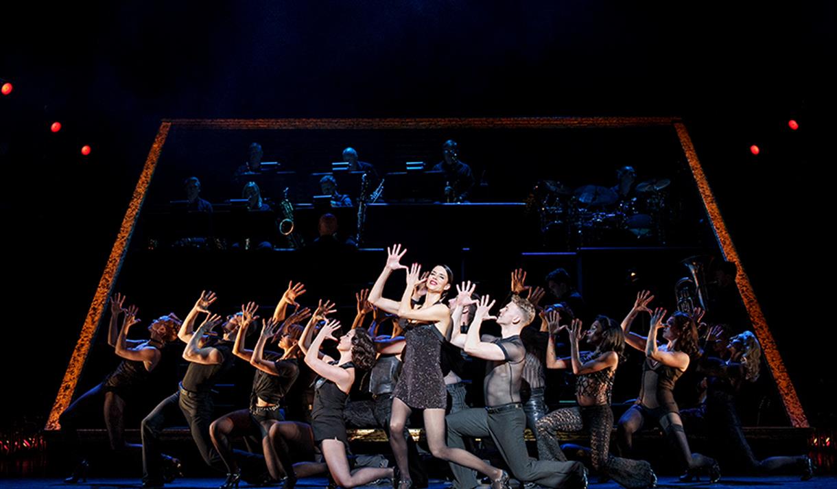 Cast of Chicago performing ensemble song