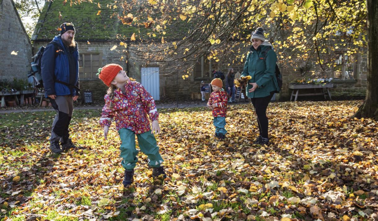Visitors exploring the grounds of Hardwick Hall