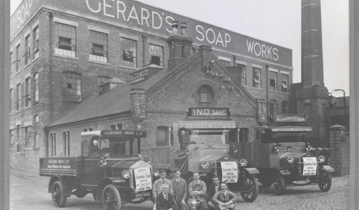 Workers pose for a picture in front of Gerard's Soap Works