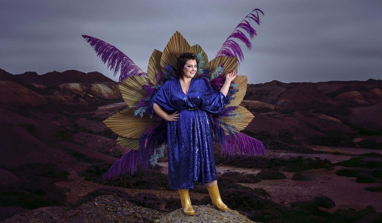 Photo of Kiri Pritchard-McLean with peacock feathers