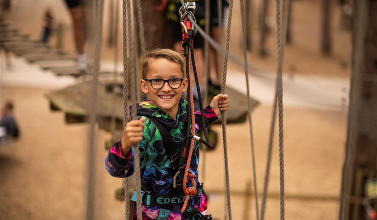 Young child on a rope swing