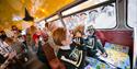 People on board the Monster Bus